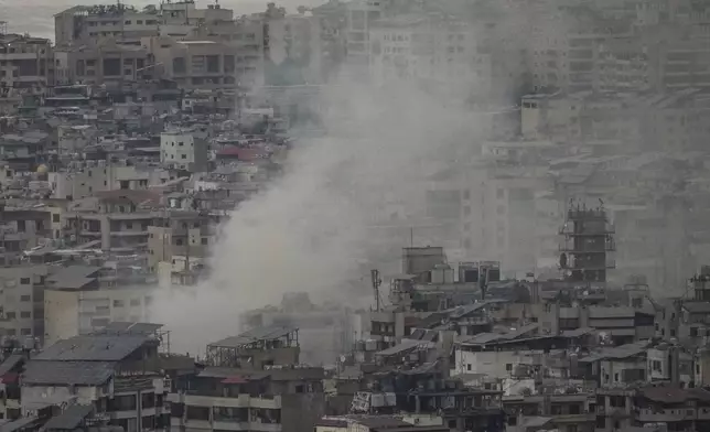 Smoke rises from an Israeli airstrike in Dahiyeh in Beirut, Lebanon, Thursday, Oct. 10, 2024. (AP Photo/Hassan Ammar)