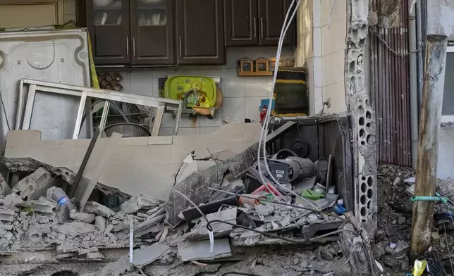 A destroyed apartment is seen in ruins at the site of an Israeli airstrike in Dahiyeh, Beirut, Lebanon, Monday, Oct. 21, 2024. (AP Photo/Hassan Ammar)