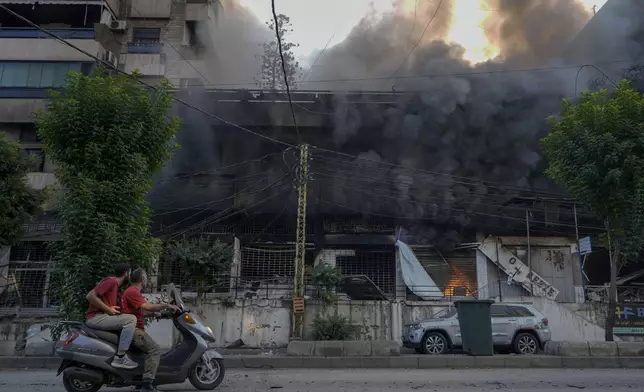 Smoke rises from a destroyed building at the site of an Israeli airstrike in Dahiyeh, Beirut, Lebanon, Sunday, Oct. 6, 2024. (AP Photo/Bilal Hussein)