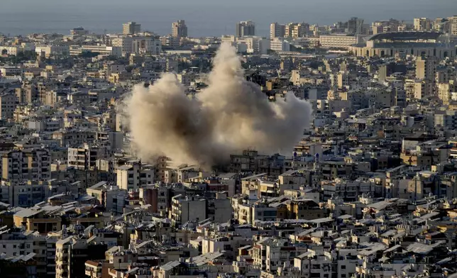 Smoke rise from Israeli airstrikes on Dahiyeh, in the southern suburb of Beirut, Lebanon, Saturday, Oct. 19, 2024. (AP Photo/Hussein Malla)