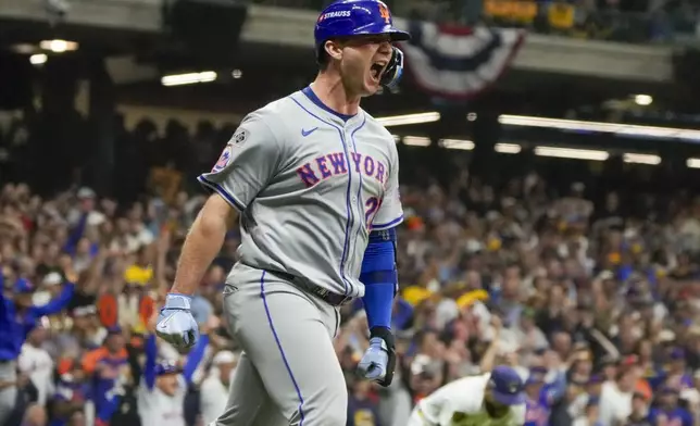 New York Mets' Pete Alonso reacts after hitting a three-run home run during the ninth inning of Game 3 of a National League wild card baseball game against the Milwaukee Brewers Thursday, Oct. 3, 2024, in Milwaukee. (AP Photo/Morry Gash)