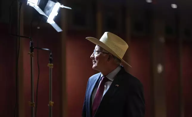 U.S. Ambassador to Mexico Ken Salazar arrives to a press conference at the new embassy still under construction, in Mexico City, Tuesday, Oct. 29, 2024. (AP Photo/Moises Castillo)