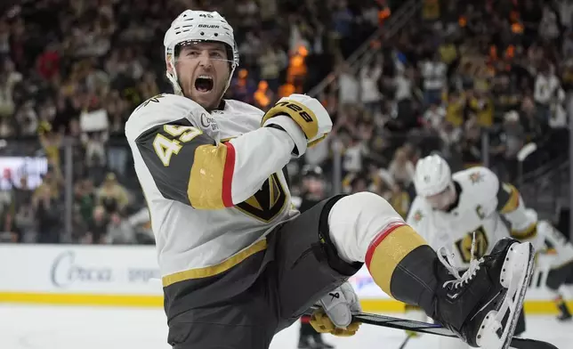 Vegas Golden Knights center Ivan Barbashev (49) celebrates after scoring against the Ottawa Senators during the second period of an NHL hockey game Friday, Oct. 25, 2024, in Las Vegas. (AP Photo/John Locher)