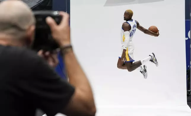 Golden State Warriors' Jonathan Kuminga poses for a photograph during the NBA basketball team's media day, Monday, Sept. 30, 2024, in Inglewood, Calif. (AP Photo/Ryan Sun)