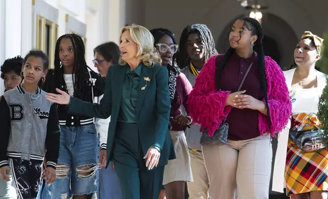 First lady Jill Biden gives students a tour of the White House on the day of the unveiling of the new enhanced White House public tour, Monday, Oct. 21, 2024, in Washington. (AP Photo/Manuel Balce Ceneta)