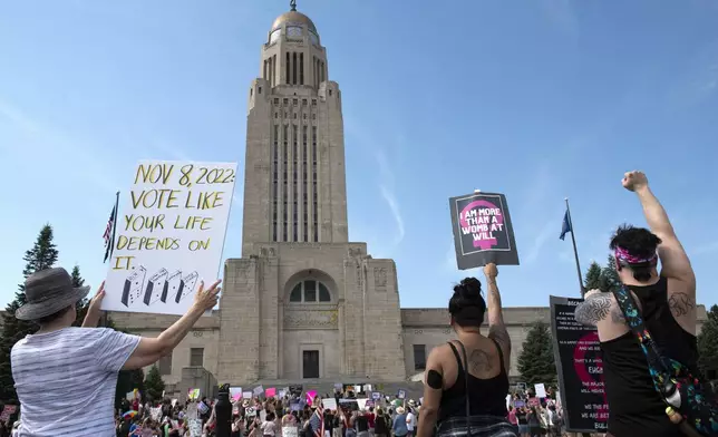 FILE - Protesters line the street around the front of the Nebraska Capitol during an Abortion Rights Rally, July 4, 2022, in Lincoln, Neb. (Kenneth Ferriera/Lincoln Journal Star via AP, File)