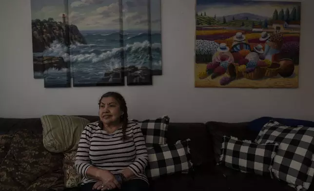 Marina Maalouf, a longtime resident of Hillside Villa, sits for a photo in her apartment in Los Angeles, Tuesday, Oct. 1, 2024. (AP Photo/Jae C. Hong)