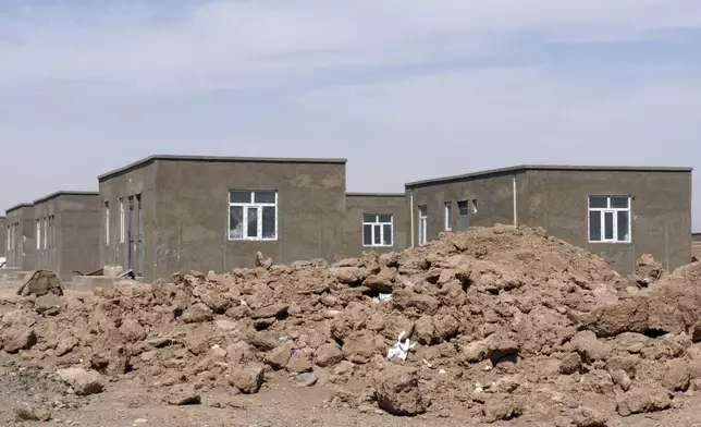 New houses are seen in Zinda Jan district, of Herat province, in western Afghanistan, Saturday, Sept. 28, 2024 following a 6.3 magnitude earthquake on Oct. 7, 2023. (AP Photo/Omid Haqjoo)