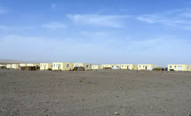 New houses are seen is seen in Zinda Jan district, of Herat province, in western Afghanistan, Saturday, Sept. 28, 2024 following a 6.3 magnitude earthquake on Oct. 7, 2023. (AP Photo/Omid Haqjoo)