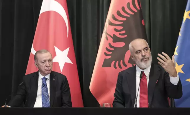 Prime Minister of Albania Edi Rama, right, speaks next Turkey's President Recep Tayyip Erdogan during a join news conference and after their meeting, in Tirana, Albania, Thursday, Oct. 10, 2024. (AP Photo/Vlasov Sulaj)