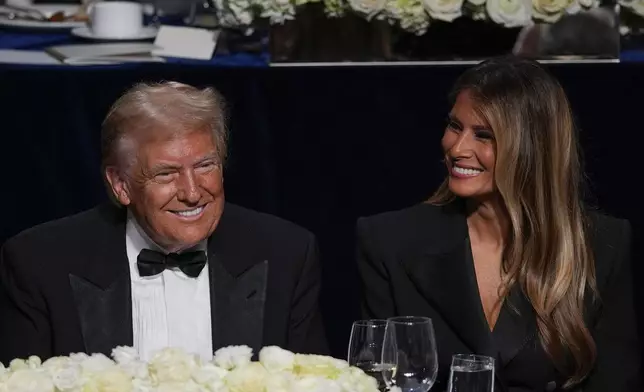 Republican presidential nominee former President Donald Trump and former first lady Melania Trump attend the 79th annual Alfred E. Smith Memorial Foundation Dinner, Thursday, Oct. 17, 2024, in New York. (AP Photo/Julia Demaree Nikhinson)