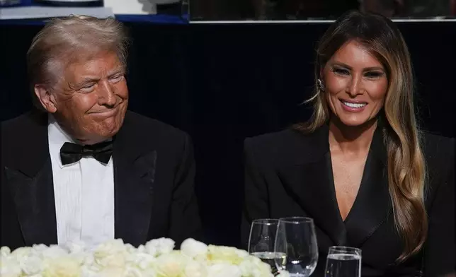 Republican presidential nominee former President Donald Trump and former first lady Melania Trump attend the 79th annual Alfred E. Smith Memorial Foundation Dinner, Thursday, Oct. 17, 2024, in New York. (AP Photo/Julia Demaree Nikhinson)