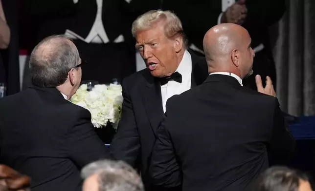 Republican presidential nominee former President Donald Trump arrives at the 79th annual Alfred E. Smith Memorial Foundation Dinner, Thursday, Oct. 17, 2024, in New York. (AP Photo/Julia Demaree Nikhinson)