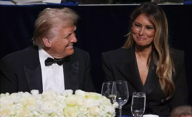 Republican presidential nominee former President Donald Trump and former first lady Melania Trump attend the 79th annual Alfred E. Smith Memorial Foundation Dinner, Thursday, Oct. 17, 2024, in New York. (AP Photo/Julia Demaree Nikhinson)