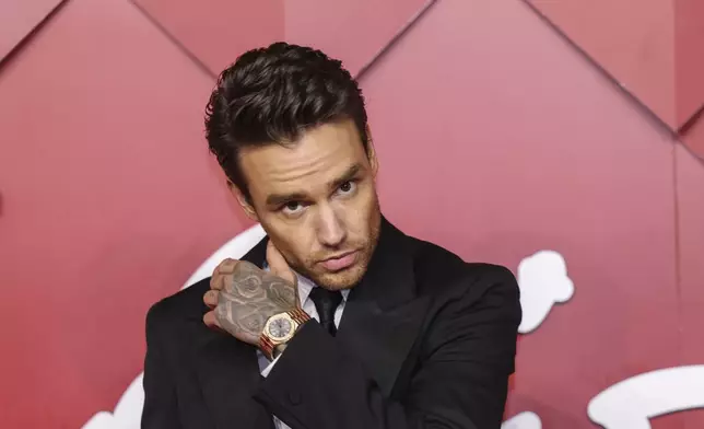 FILE - Liam Payne poses for photographers upon arrival at the British Fashion Awards in London, Dec. 5, 2022. (Photo by Vianney Le Caer/Invision/AP, File)