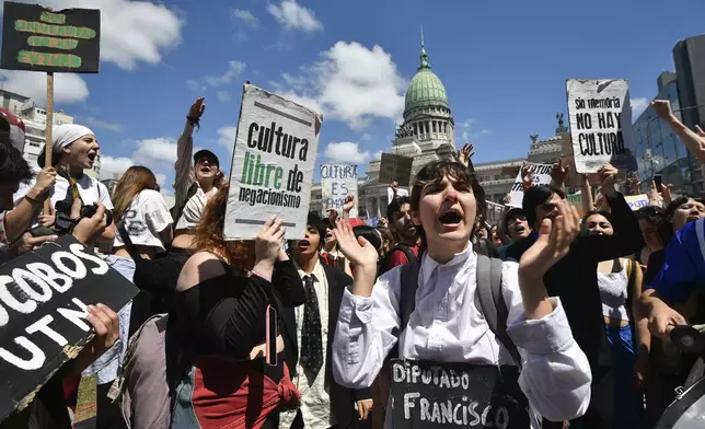 Students and professors rally outside Congress as lawmakers debate President Javier Milei's veto of a law to increase funding for public universities in Buenos Aires, Argentina, Wednesday, Oct. 9, 2024. (AP Photo/Gustavo Garello)