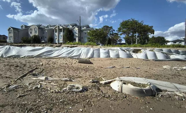 Sandbags installed after Hurricane Sandy can be seen after more than a decade of erosion Wednesday, Oct. 9, 2024, at a beach near Tottenville, Staten Island, at the southernmost tip of New York City. (AP Photo/Cedar Attanasio)