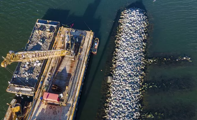 Construction is wrapping up on eight "Living Breakwaters" at the southernmost tip of New York City, off the coast of Staten Island, Wednesday, Oct. 9, 2024. (AP Photo/Ted Shaffrey)