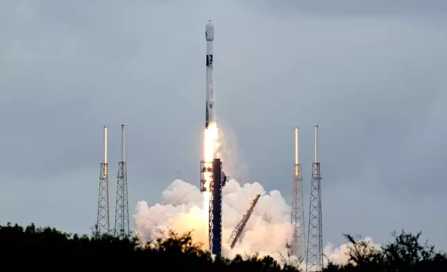 A SpaceX Falcon 9 rocket lifts off from the Cape Canaveral Space Force Station, Monday, Oct. 7, 2024 at Cape Canaveral, Fla., carrying a European spacecraft to an asteroid. (AP Photo/John Raoux)