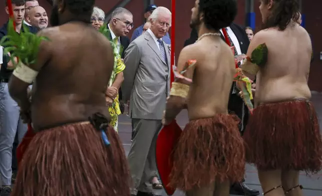 Britain's King Charles III watches a performance by the Mui Mui Bumer Gedlam group during a visit to the National Centre of Indigenous Excellence on Tuesday Oct. 22, 2024 in Sydney, Australia. (Lisa Maree Williams/Pool Photo via AP)