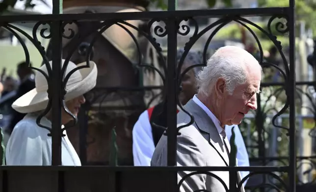 King Charles III, right, and Queen Camilla, left, arrive for a visit to St Thomas' Anglican Church in Sydney, Sunday, Oct. 20, 2024. (Dean Lewins/Pool Photo via AP)