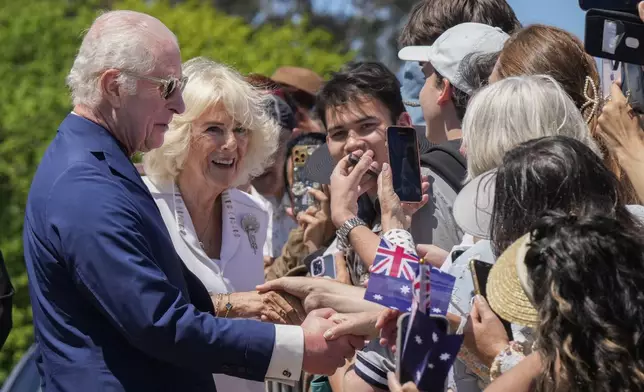 Britain's King Charles III, and Queen Camilla greets by public at the Australian War Memorial in Canberra, Monday, Oct. 21, 2024. (AP Photo/Mark Baker, Pool)