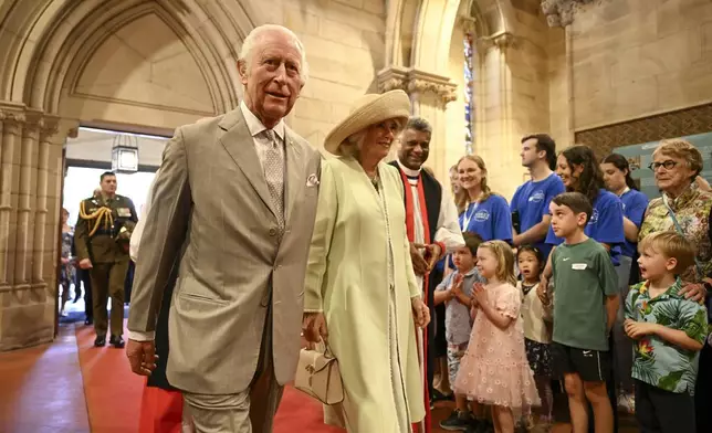 King Charles III and Queen Camilla arrive for a visit to St Thomas' Anglican Church in Sydney, Sunday, Oct. 20, 2024. (Dean Lewins/Pool Photo via AP)