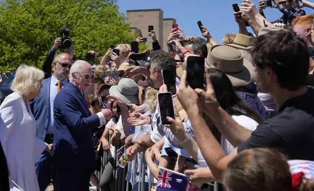 Britain's King Charles III, and Queen Camilla greets by public at the Australian War Memorial in Canberra, Monday, Oct. 21, 2024. (AP Photo/Mark Baker, Pool)