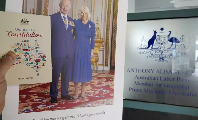 A Nationhood pack is seen in Sydney, Thursday, Oct. 3, 2024, which includes a portrait of Britain's King Charles III and Queen Camilla that are available under a little-known government policy that says every Australian can request, and receive, a portrait of their monarch. (AP Photo/Rick Rycroft)