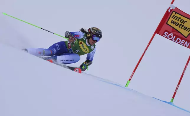 Italy's Federica Brignone speeds down the course during an alpine ski, women's World Cup giant slalom, in Soelden, Austria, Saturday, Oct. 26, 2024. (AP Photo/Marco Trovati)