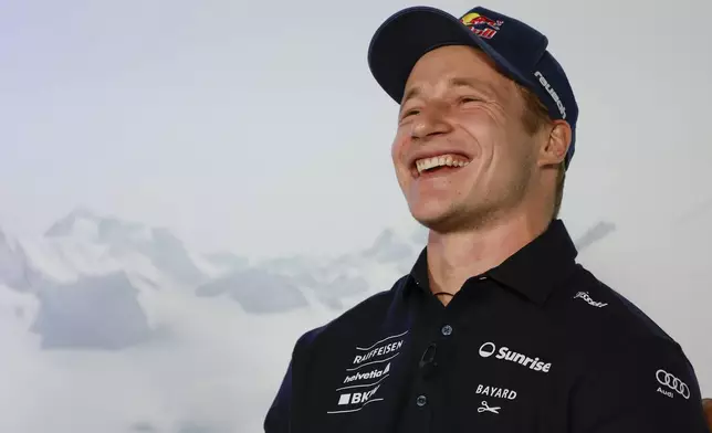 Switzerland's Marco Odermatt meets the media ahead of an alpine ski, men's World Cup giant slalom in Soelden Austria, Friday, Oct. 25, 2024. (AP Photo/Alessandro Trovati)