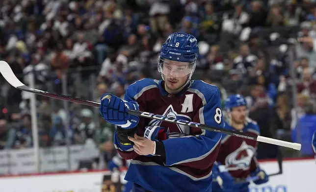 FILE - Colorado Avalanche defenseman Cale Makar warms up for the second period of Game 4 of an NHL hockey Stanley Cup playoff series Monday, May 13, 2024, in Denver. (AP Photo/David Zalubowski)