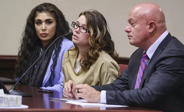 Hannah Gutierrez-Reed, the weapons supervisor on the set of the Western film “Rust," center, speaks to Judge T. Glenn Ellington during her plea hearing at the First Judicial District Courthouse in Santa Fe, N.M., Monday, Oct. 7, 2024. (Gabriela Campos/Santa Fe New Mexican via AP, Pool)