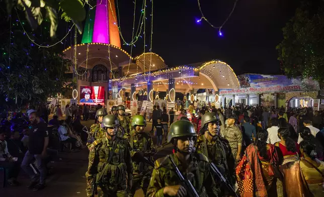 Bangladesh army soldiers patrol around the Dhakeshwari National Temple during the Durgapuja festival in Dhaka, Bangladesh, on Oct. 10, 2024. (AP Photo/Rajib Dhar)