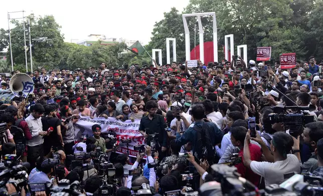 Protesters gather to demand the resignation of President Mohammed Shahabuddin after his comments that he had no documents proving that former Prime Minister Sheikh Hasina had resigned before fleeing the country, in Dhaka, Bangladesh, Tuesday, Oct. 22, 2024. (AP Photo/Mahmud Hossain Opu)