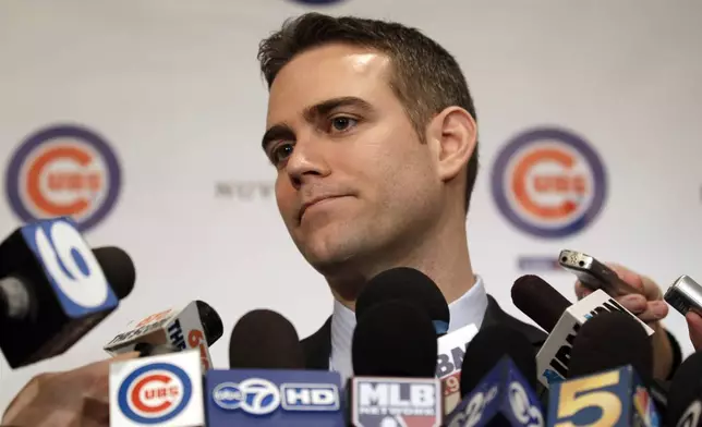 FILE - Chicago Cubs president Theo Epstein speaks to reporters during the 27th annual Chicago Cubs baseball convention, in Chicago, Jan. 13, 2012. (AP photo/Nam Y. Huh, File)