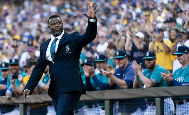 FILE - Former Seattle Mariners player Ken Griffey Jr. arrives during the induction ceremony for former pitcher Félix Hernández into the Mariners Hall of Fame, Aug. 12, 2023, in Seattle. (AP Photo/Lindsey Wasson, File)