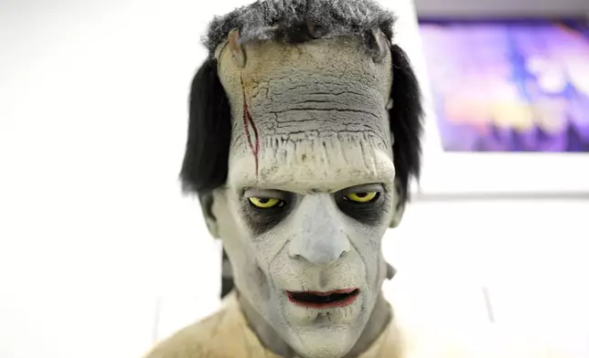 A Frankenstein mask is seen on display at The Theatrical Shop, Tuesday, Oct. 29, 2024, in West Des Moines, Iowa. (AP Photo/Charlie Neibergall)