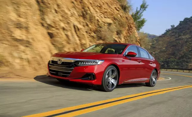 This photo provided by Honda shows a 2022 Accord Hybrid. The EPA estimates it gets up to 47 mpg in combined city/highway driving. (Courtesy of American Honda Motor Co. via AP)