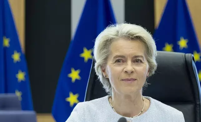 European Commission President Ursula von der Leyen smiles as she waits for the start of the weekly College of Commissioners meeting at the EU headquarters in Brussels, Wednesday, Oct. 2, 2024. (AP Photo/Omar Havana)