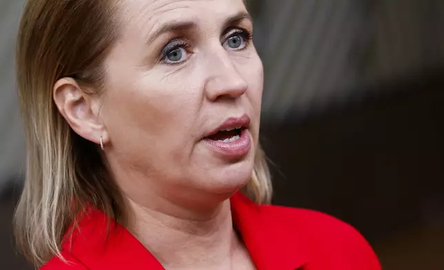 Denmark's Prime Minister Mette Frederiksen talks to journalists during an EU summit in Brussels, Thursday, Oct. 17, 2024. (AP Photo/Geert Vanden Wijngaert)