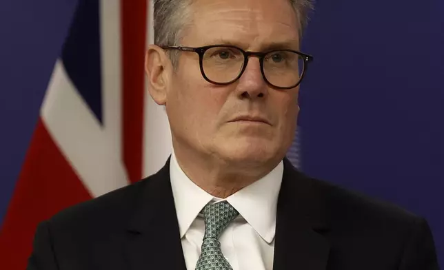 Britain's Prime Minister Keir Starmer listens during a meeting with European Commission President Ursula von der Leyen in Brussels, Wednesday, Oct. 2, 2024.(AP Photo/Omar Havana)