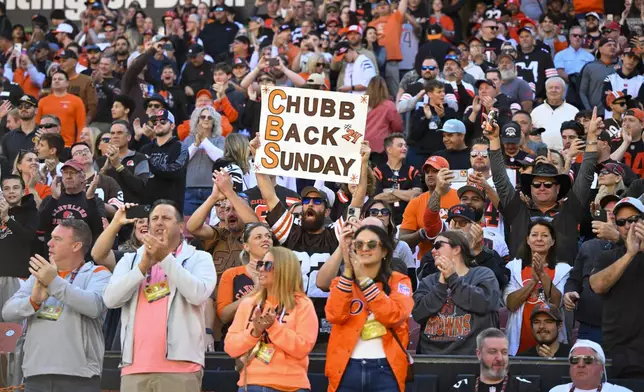 Fans cheer for Cleveland Browns running back Nick Chubb before an NFL football game against the Cincinnati Bengals, Sunday, Oct. 20, 2024, in Cleveland. (AP Photo/David Richard)