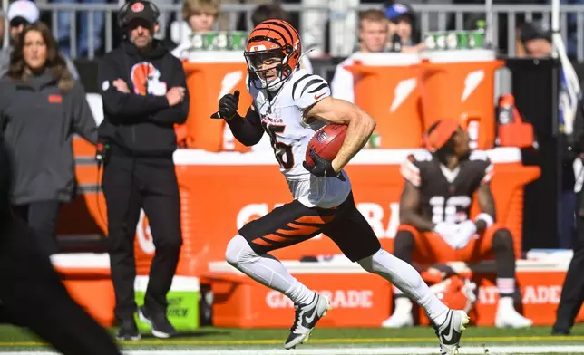 Cincinnati Bengals wide receiver Charlie Jones returns the opening kickoff for a touchdown in the first half of an NFL football game against the Cleveland Browns, Sunday, Oct. 20, 2024, in Cleveland. (AP Photo/David Richard)