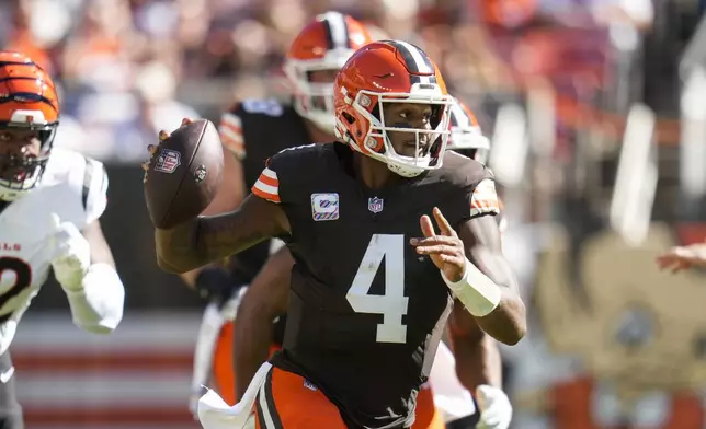 Cleveland Browns quarterback Deshaun Watson (4) looks to pass in the first half of an NFL football game against the Cincinnati Bengals, Sunday, Oct. 20, 2024, in Cleveland. (AP Photo/Sue Ogrocki)