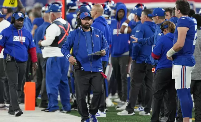 New York Giants head coach Brian Daboll walks the sideline during the first half of an NFL football game against the Cincinnati Bengals, Sunday, Oct. 13, 2024, in East Rutherford, N.J. (AP Photo/Seth Wenig)