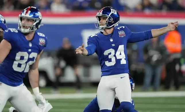 New York Giants kicker Greg Joseph watches his missed field goal in the second half of an NFL football game against the Cincinnati Bengals, Sunday, Oct. 13, 2024, in East Rutherford, N.J. (AP Photo/Seth Wenig)