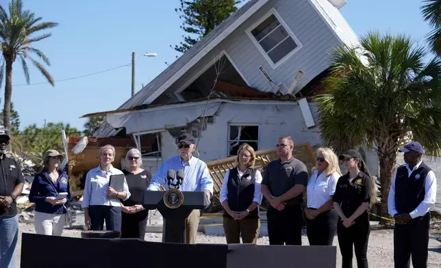 President Joe Biden speaks following a briefing by federal, state, and local officials in St. Pete Beach, Fla., during a tour of areas affected by Hurricane Milton, Sunday, Oct. 13, 2024. (AP Photo/Manuel Balce Ceneta)