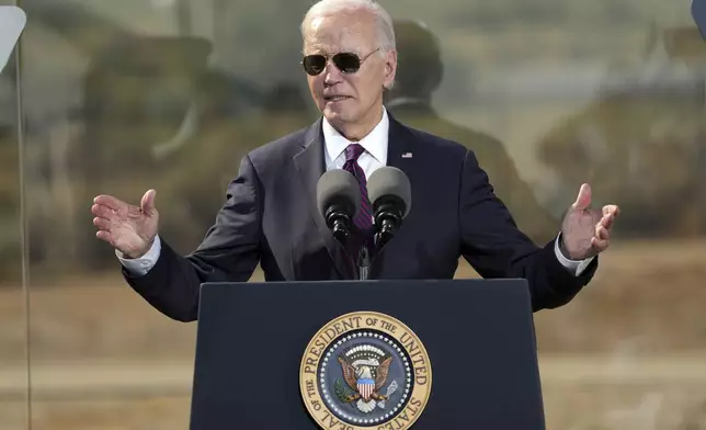 President Joe Biden speaks at the Gila Crossing Community School, Friday, Oct. 25, 2024, in Laveen, Ariz. (AP Photo/Rick Scuteri)