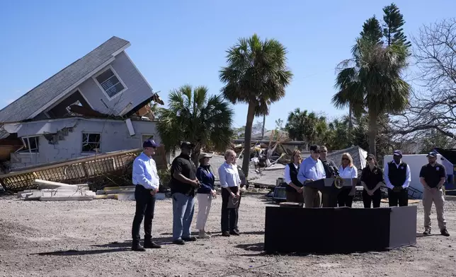 President Joe Biden speaks following a briefing by federal, state, and local officials in St. Pete Beach, Fla., during a tour of areas affected by Hurricane Milton, Sunday, Oct. 13, 2024. (AP Photo/Manuel Balce Ceneta)